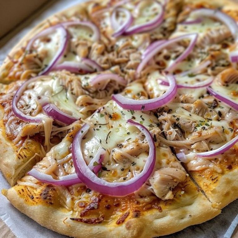 Unikalny artykuł na temat “Domowej Pizzy Tuńczykowej z Czerwoną Cebulą”